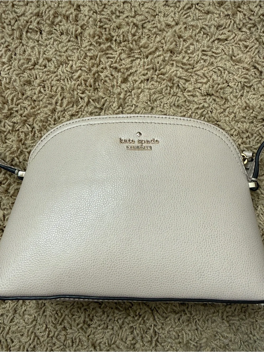kate spade pebble leather dome crossbody in light taupe